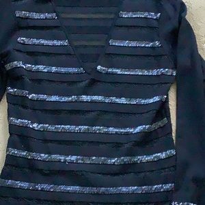 Women’s black top by Essence